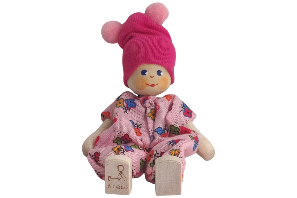 Anne Krebs Miniatur Puppe Baby mit Bommelmütze rosa