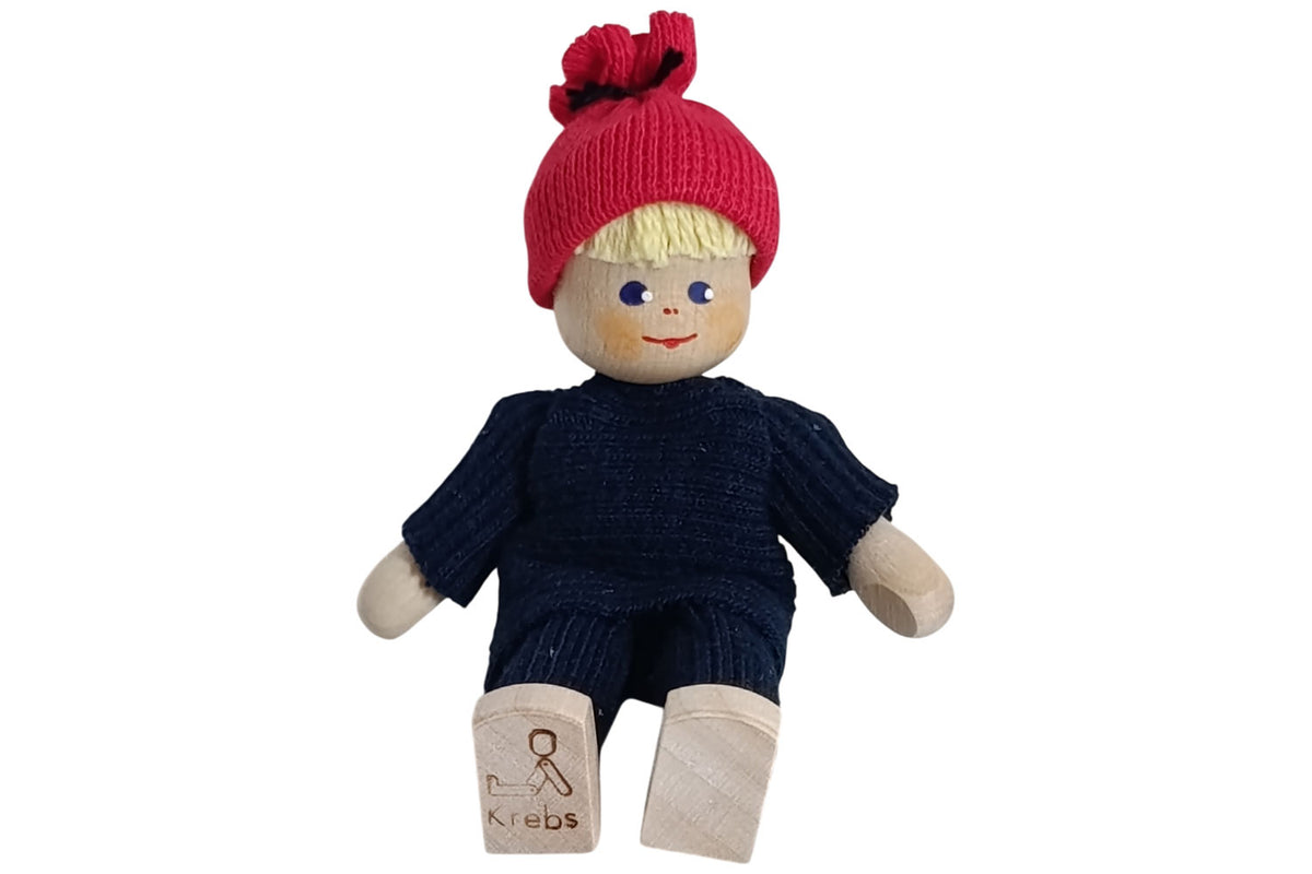 Anne Krebs Miniatur Puppe Mädchen blond mit roter Pudelmütze