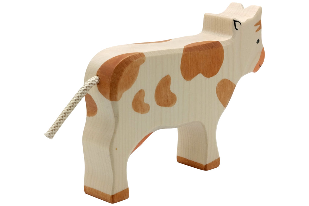 Holztiger Kuh stehend braun