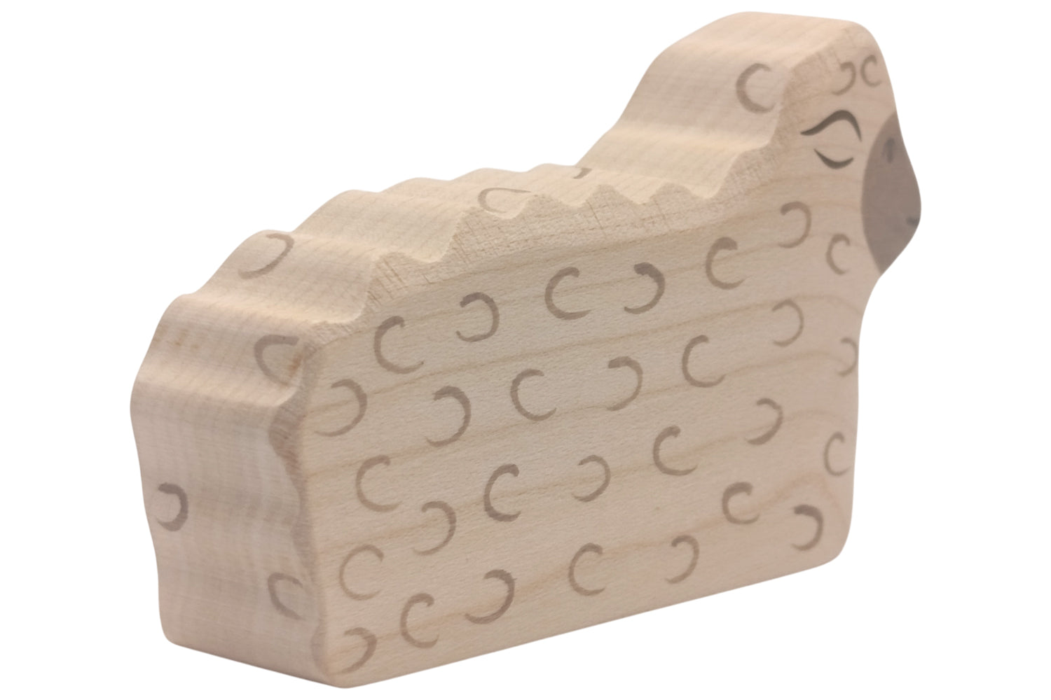 Holztiger Schaf liegend