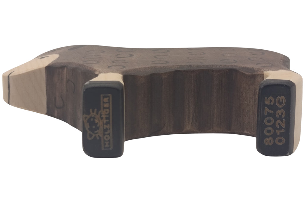Holztiger Schaf schwarz stehend
