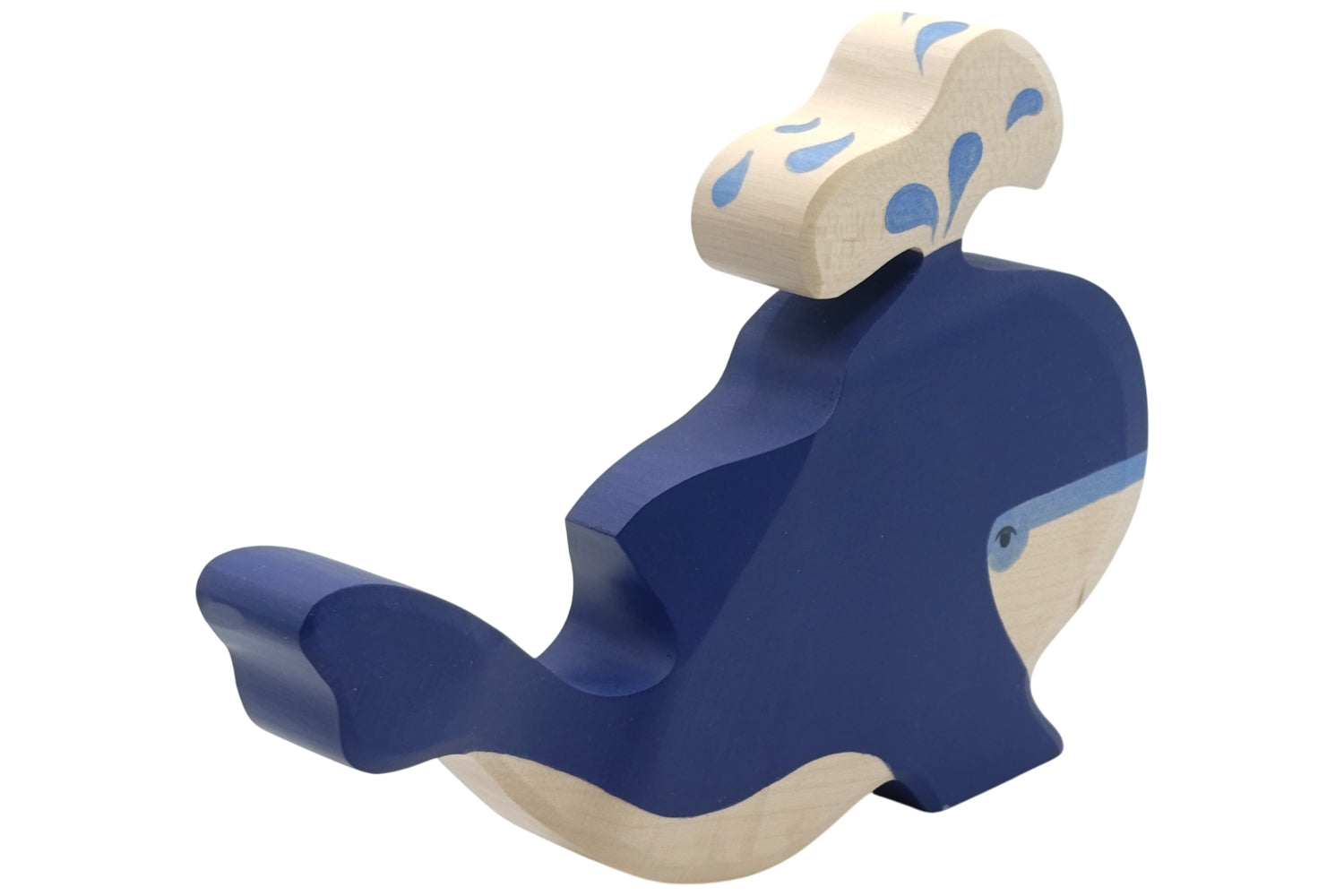 Holztiger Blauwal mit Wasserfontäne